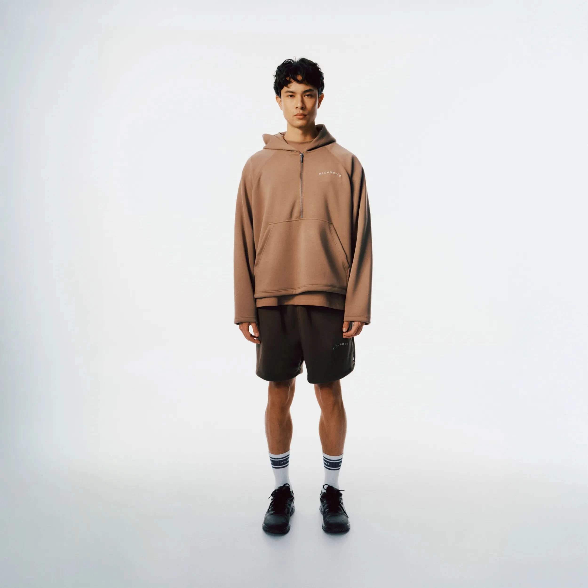 Richboyz Airy Quarter Zip Hoodie Khaki lifestyle shot, post-workout luxury streetwear, Wear The After collection