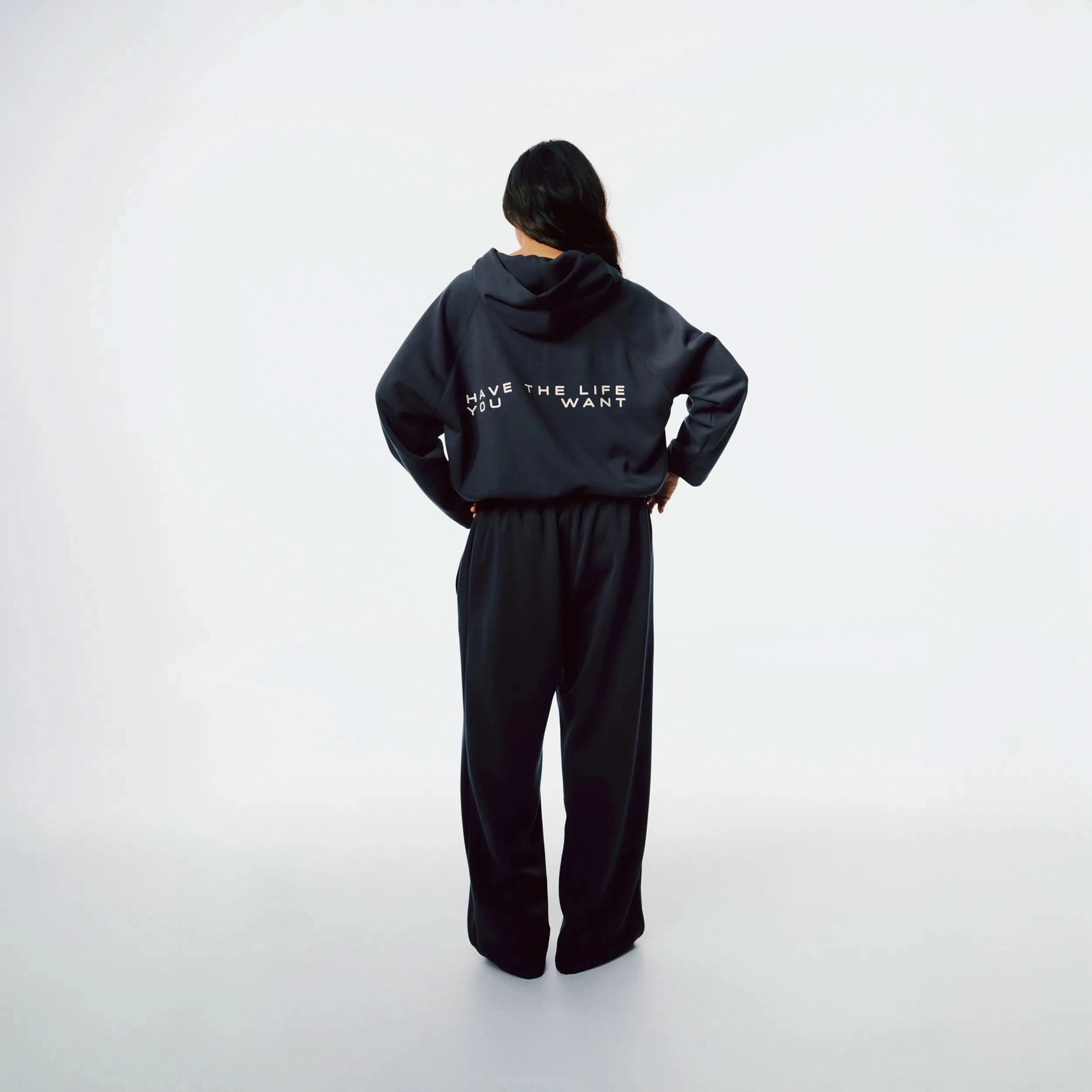 Richboyz Airy Quarter Zip Hoodie Navy Blue lifestyle shot, post-workout luxury streetwear, Wear The After collection