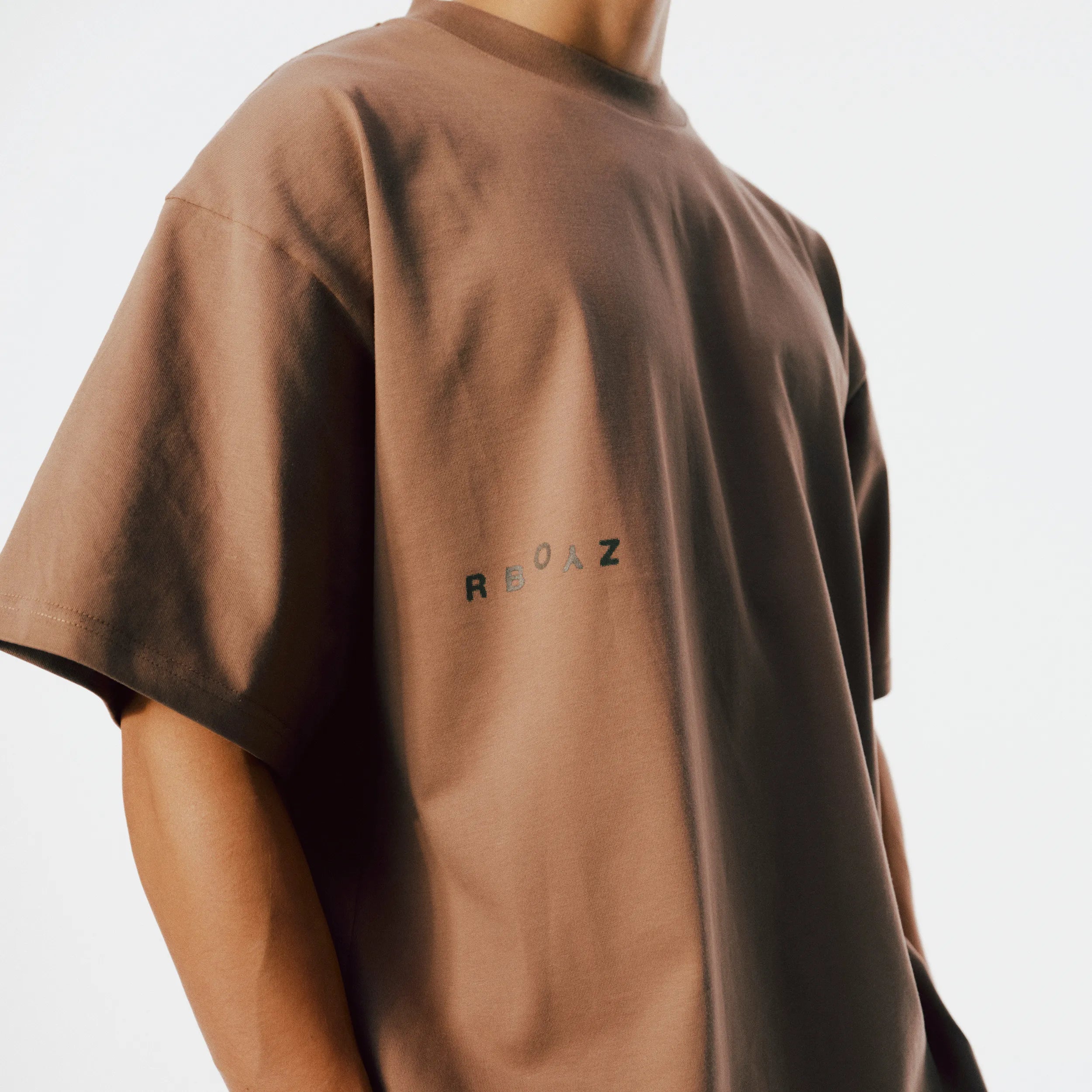 Close-up of Club Tee soft fabric texture and clean finish in Khaki