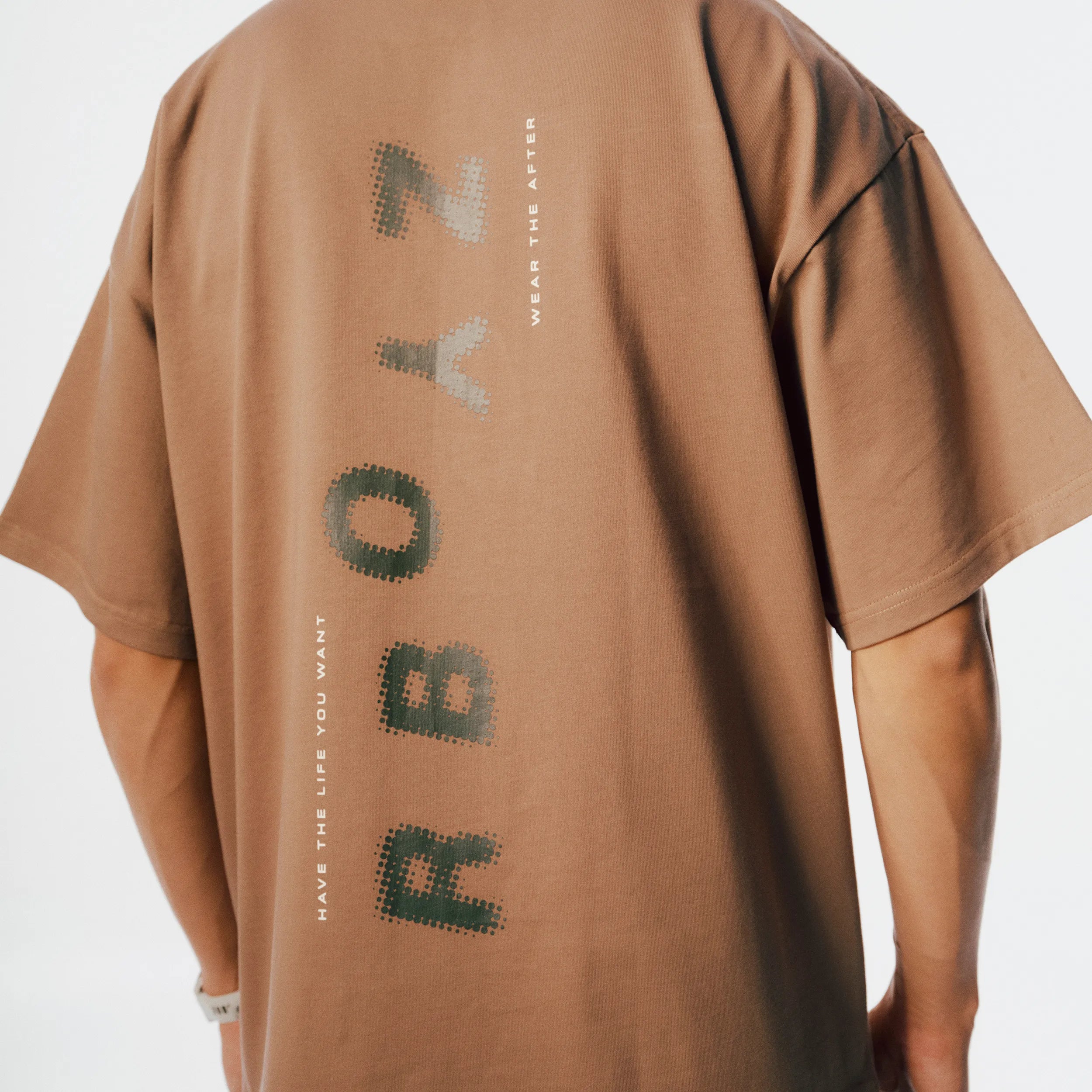 Close-up of Club Tee soft fabric texture and clean finish in Khaki