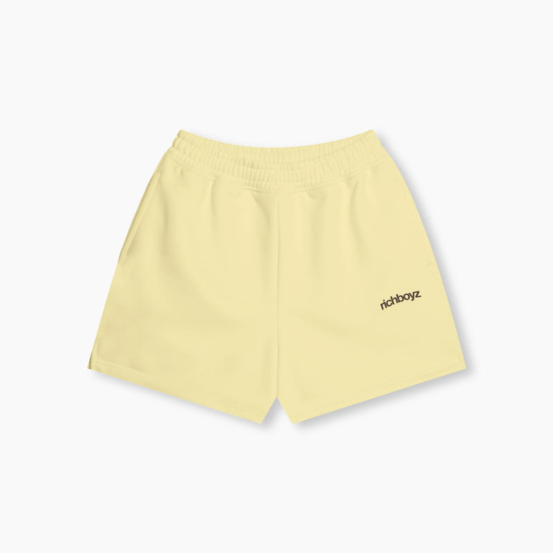 Yellow shorts with 'richboyz' branding on a white background