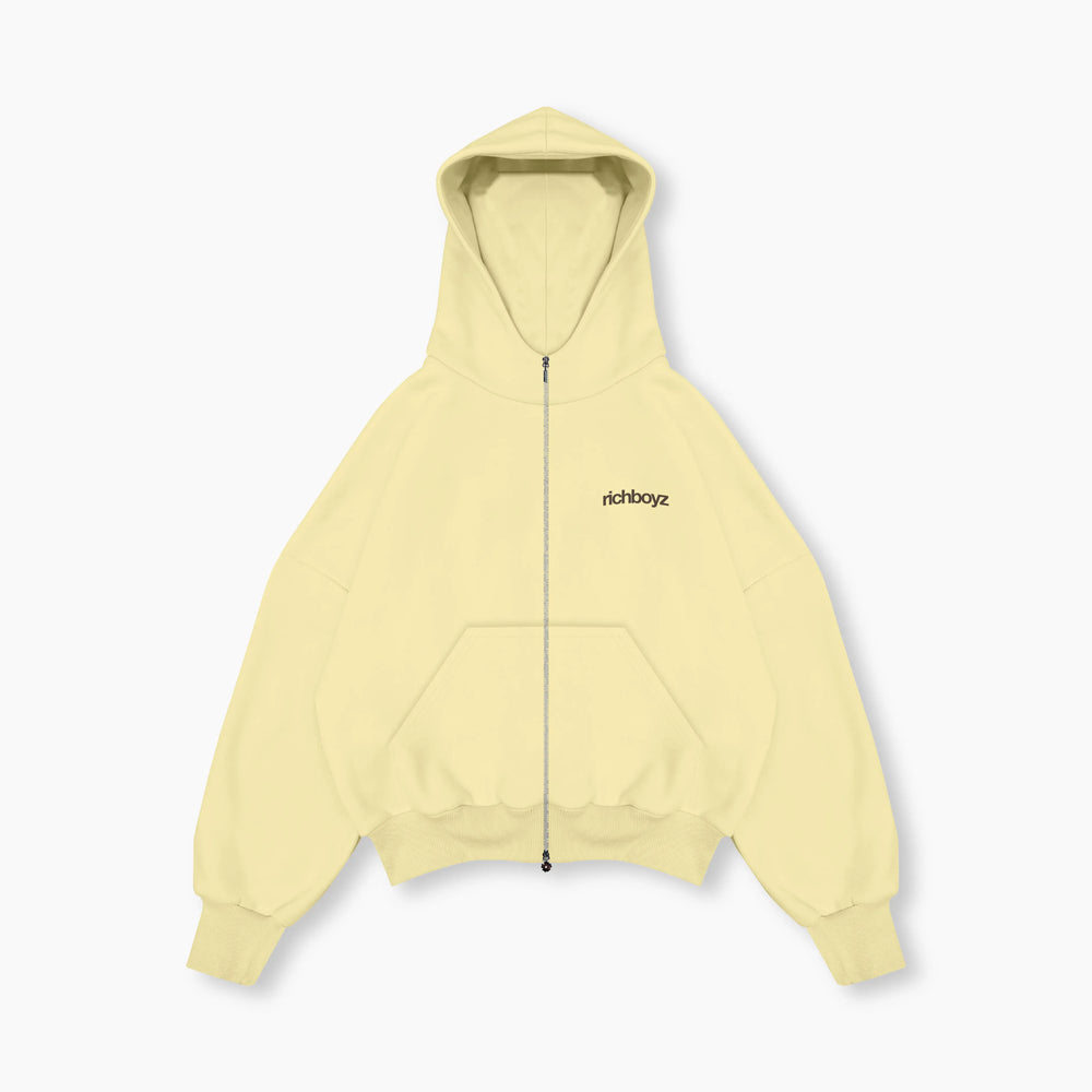 Light yellow hoodie with a brand logo on a white background