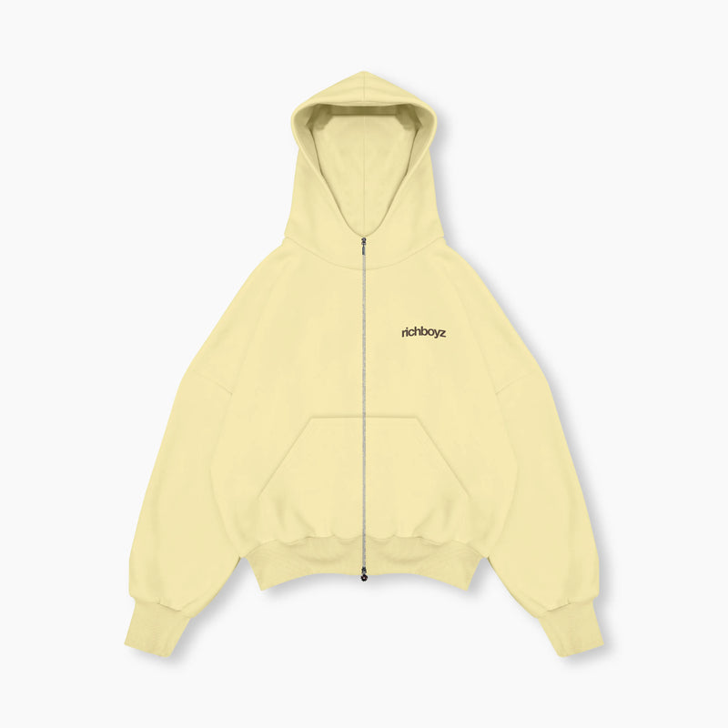 Light yellow hoodie with a brand logo on a white background
