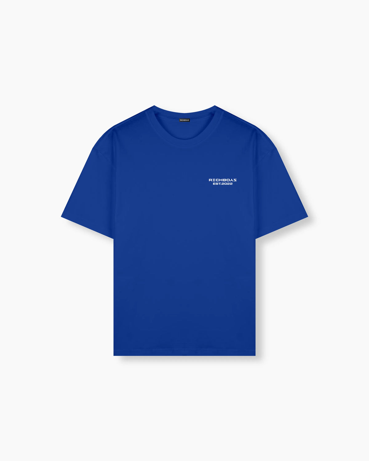 Blue t-shirt with a small white logo on a white background