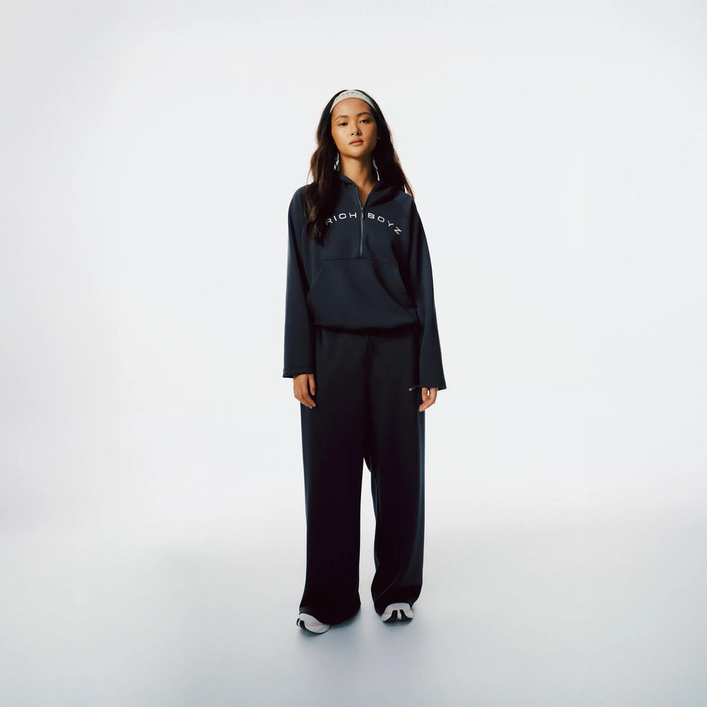 Richboyz Airy Quarter Zip Hoodie Navy Blue lifestyle shot, post-workout luxury streetwear, Wear The After collection