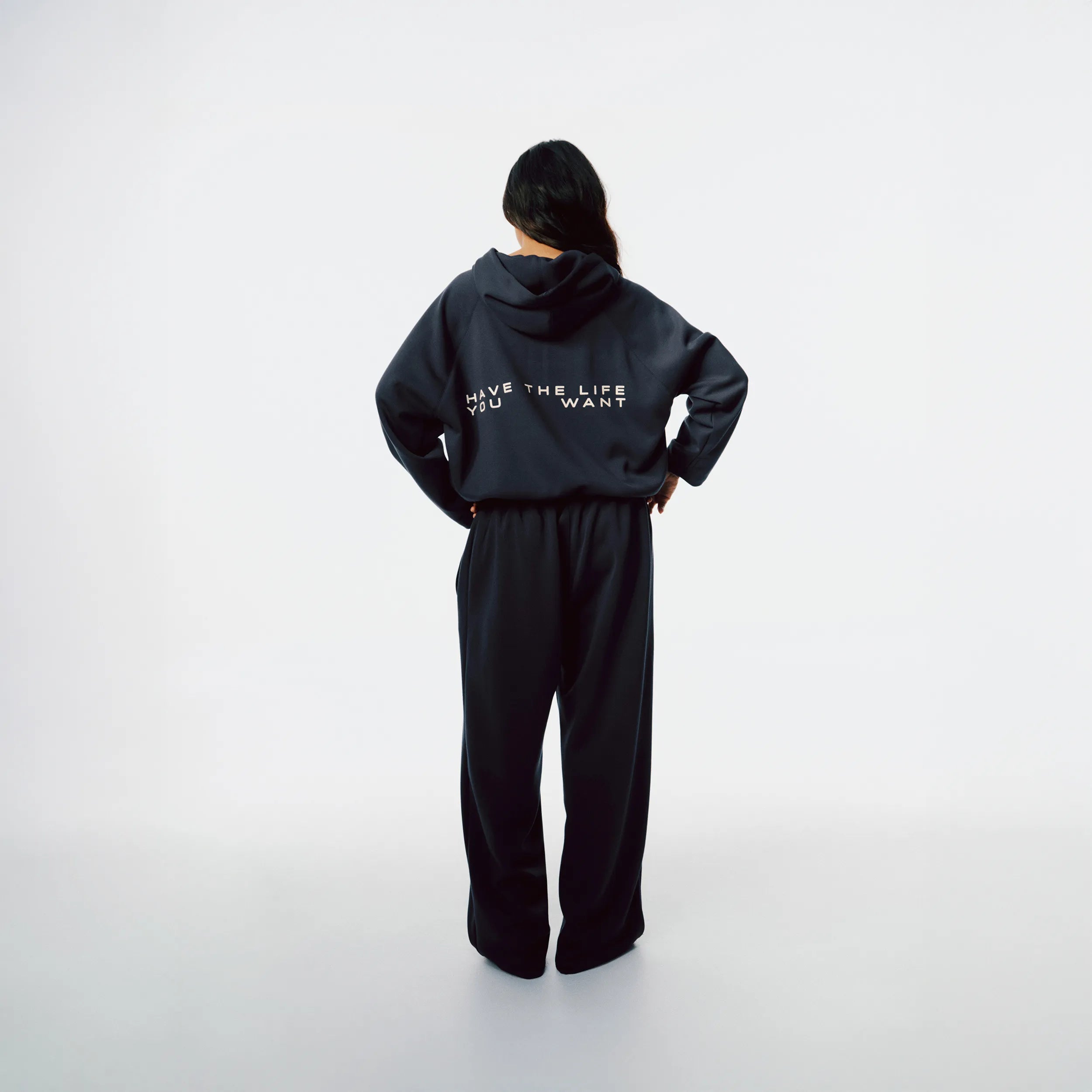 Richboyz Airy Quarter Zip Hoodie Navy Blue lifestyle shot, post-workout luxury streetwear, Wear The After collection