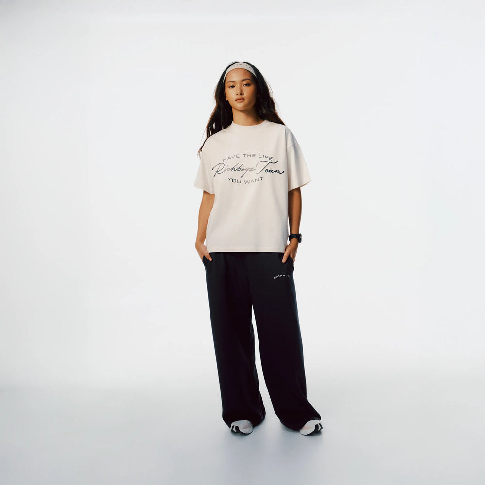 Richboyz Club Tee White lifestyle shot, post-workout luxury streetwear, Wear The After collection