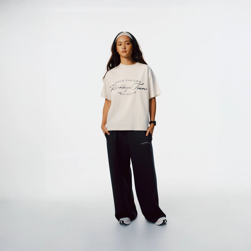 Richboyz Club Tee White lifestyle shot, post-workout luxury streetwear, Wear The After collection