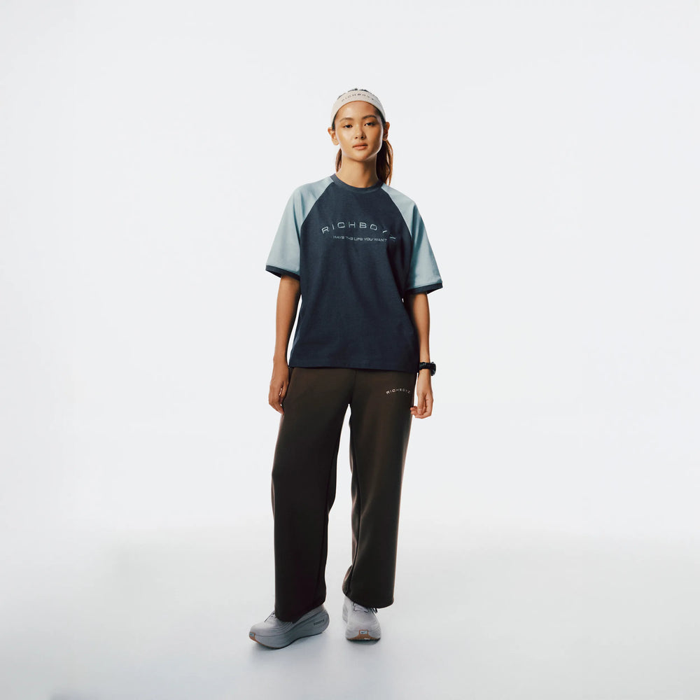 Richboyz Raglan Tee Denim Blue lifestyle shot, post-workout luxury streetwear, Wear The After collection